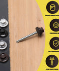 Professional Grade Size 10 X One And A Half Inch Black Hex Head Self Drilling Roofing Screws with EPDM rubber washer on wood.