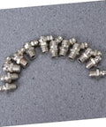 45 Piece Grease Fitting Assortment Kit With Straight Bend And Elbow Styles for Hydraulic Systems displayed on gray surface