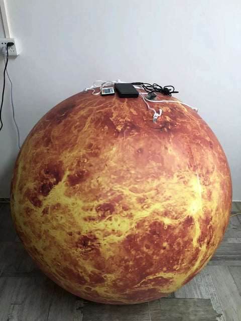 60 Inch Inflatable Venus Planet Balloon For Astronomy Education And Planetarium Decor, Great For Schools, Museums, Parties, And Large Events, Ceiling Or Ground Display, Includes Air Pump, RGB Lights, Ropes, And Durable 0.25mm PVC. Ground view with ropes and pump