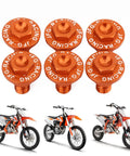 Six Piece Front Fork Guard Bolts Set For KTM Dirt Bikes CNC Machined Aluminum Lightweight Front Fork Bottom Protectors Fits 50 SX 65 SX 85 SX 125 SX 530 SX SX F XC F EXC F XC W XCF W Freeride 250F 250R 350 690 Enduro, shown with orange bolts and KTM bikes.
