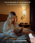 Super Sleek Battery Operated Wall Sconces Set Of 2 With Remote Control And Rechargeable RGB Bulbs In Classic Gold illuminating cozy reading nook.