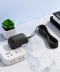 AC DC Adapter For Sewing Machines 6V Power Supply With 1.2M Cord on table with power strip and plant