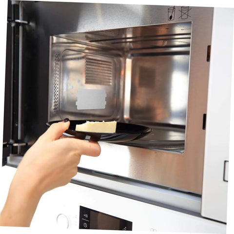 Open microwave oven showing installed 10 Piece Microwave Mica Sheets Set For Replacement Mica Plates Heat Resistant Insulation.
