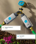 Smart Hose Timer With Two Valves And One WiFi Hub App Controlled Outdoor Faucet Timer attached to a wall faucet with garden hoses