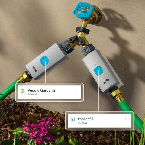 Smart Hose Timer With Two Valves And One WiFi Hub App Controlled Outdoor Faucet Timer attached to a wall faucet with garden hoses