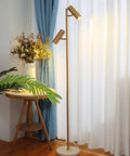 Cozy Elegant Modern Floor Lamp With Brass Finish, Tall Uplight Tree Style For Bedroom, Living Room Or Office near window.