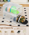 Sleek Stackable Clear Hat Organizer Two Pack With Smooth Glide Drawers holds a dozen baseball caps in transparent boxes.