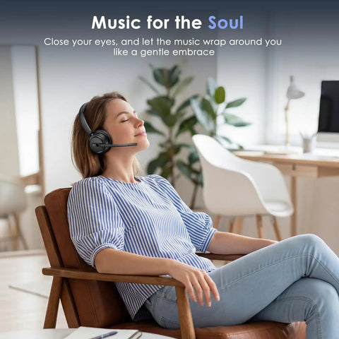 Person relaxing at home with Wireless Headset With Noise Canceling Microphone For Clear Calls, seated in an office chair