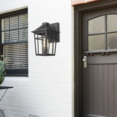 Outdoor Sconce Lights Wall Fixtures For Front Porch And Patio Yard With Glass Panels Aluminum Exterior Lanterns Waterproof Weatherproof And Rust Resistant Build No Fuss Install 2 Pack Black mounted on house exterior.