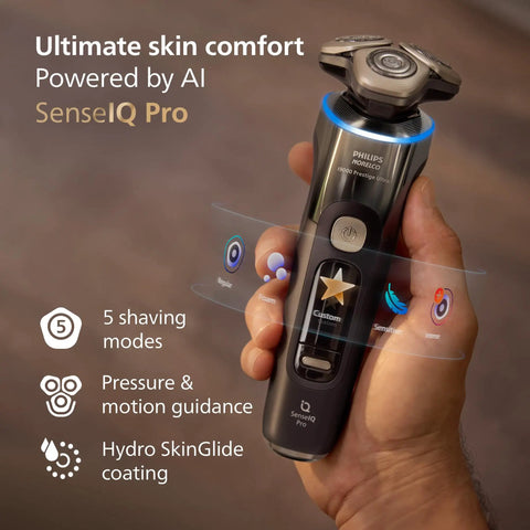 Clutch Ultra Precise Wet And Dry Electric Shaver With SenseIQ Pro Technology 360 Flex Heads Triple Lift And Cut System NanoTech Precision Blades For A Close Daylong Shave Quick Clean Pod Included Dark Slate held in hand