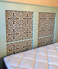 Bed headboard featuring copper faux tin PVC ceiling tiles 2x2 glue up easy install paintable tin look ceiling tiles for quick DIY makeover