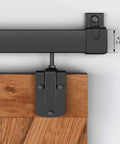 Close-up of Exterior Sliding Barn Door Hardware Track Kit With 96 Inch Black Track, Heavy Duty 500 Lb Capacity, Weatherproof Wall Mount System