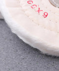 Close-up of the Low Noise 6 Inch Cloth Buffing Wheels 2 Pack White Felt Polishing Pads for grinder, showing stitched edge.