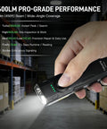 Person holding Go-To 3-In-1 Flat EDC Flashlight With 1600 Lumen White LED, Green Beam And UV in a warehouse setting.