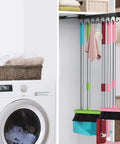 Pull Out Broom Holder With Adjustable Double Row Sliding Hooks holding mop and broom in laundry room, heavy-duty aluminum rail