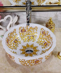 Slick White Ceramic Vessel Sink For Above Counter Bathroom Vanity With Top Shelf Glossy Glaze And Dead Simple Cleanup Round Art Bowl Shape Durable Porcelain, decorated with gold patterns.