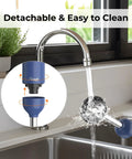 Cordless Rechargeable Immersion Hand Blender 6 In 1 Multi Function Kit With Beaker Whisk Chopper Dual Beater Blue being washed under faucet