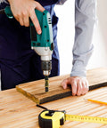 Person using drill with Self Centering Hinge Drill Bit Set 3 Pc With 5mm And One Quarter Inch Hex Shank Bits For Wood And Plastic Reaming