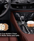 Car interior with Colorful Marble Cork Base Car Coasters Set 2 Pack in cup holder next to coffee cup.