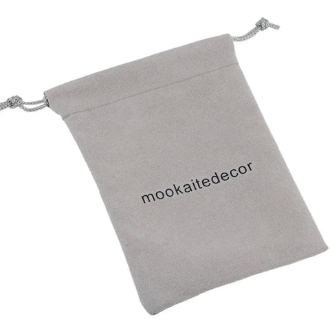 Velvet bag with 'mookaitedecor' text, included with Chakra Drawer Knobs With Screws Set Of 2 Ammonite Fossil Resin Crystal Stone Pulls