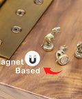 Magnetic Hinge Head T Rex Set Of 3 Miniature Door Topper Figures For Standard Hinges in copper on wood surface.