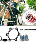 Boost Hub Conversion Kit For Bicycle Front And Rear, Plug And Play Adapters Converts 100mm X 15mm Front To 110mm X 15mm And 142mm X 12mm Rear To 148mm X 12mm Disc Brake Compatible Includes All Necessary Accessories shown on a bicycle with highlighted adapters and bolts.