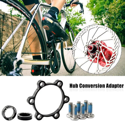 Boost Hub Conversion Kit For Bicycle Front And Rear, Plug And Play Adapters Converts 100mm X 15mm Front To 110mm X 15mm And 142mm X 12mm Rear To 148mm X 12mm Disc Brake Compatible Includes All Necessary Accessories shown on a bicycle with highlighted adapters and bolts.