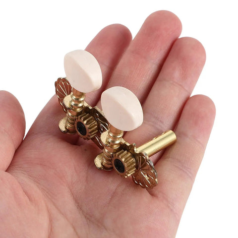 Vintage Carving Ukulele Tuning Pegs And Classical Guitar Machine Heads Replacement Parts, metal and resin pegs in hand