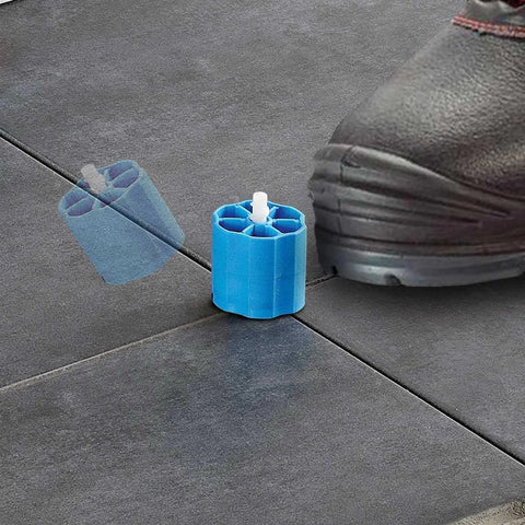 Proleveling System 1/32 Inch Extra Linear Leveler Stems Pack Of 100 for tile installations on black tiles with foot shown