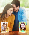 Couple enjoying photos in Six Pack Sublimation LED Photo Frames With Wood Stand 5 By 7 Inch USB Powered Night Lights Blank Frames