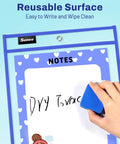 30 Pack Oversized Reusable Dry Erase Pocket Sleeves With 2 Rings 10 Assorted Colors in use, hand erasing writing on surface