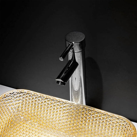 USZWBY Yellow Square Shape Tempered Glass Bathroom Vessel Sink with Waterfall Tap Modern Artistic Vessel Sink with Pop Up Drain, Counter Top Installation, close-up of faucet and sink.
