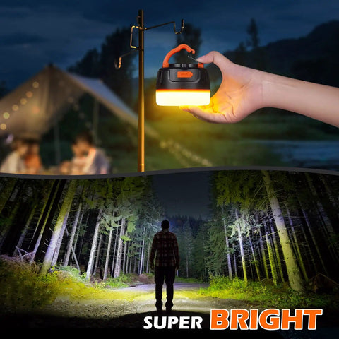 Hand holding Rechargeable Go To Camping Lantern With 6400mAh Battery For Long Runtime IPX5 Waterproof Tent Light shining in forest