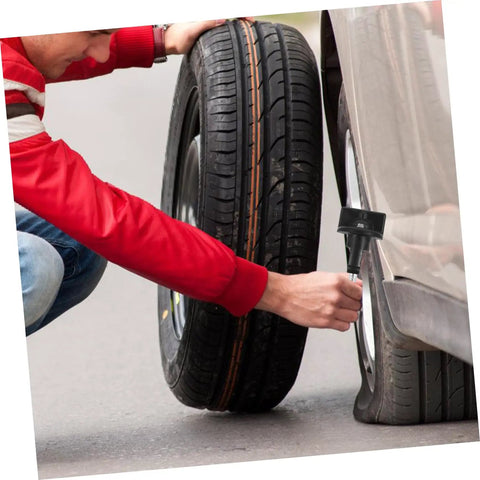 Man with red jacket changing tire using Spare Tire Hold Down Bolt for Trucks and Cars, Easy Install Wheel Bolt Replacement