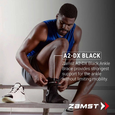 Athlete wearing A2 DX Sports Ankle Brace With Protective Guards For High Ankle Sprains And Chronic Instability, Black Right Small