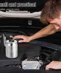 Real Deal Pneumatic Paint Sprayer With Tough Metal Housing for Slick Furniture Finishing and Car Refinishing on car engine.