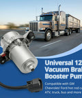 Close-up of universal 12V vacuum brake booster pump with electrical connector; large truck in background.