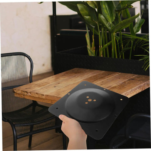 Built Different Square Metal Table Leg Connectors Quick Snap Fit Design For Reliable Sofa And Bench Hardware Straight Setup Heavy Duty Black Iron Furniture Mounting Plates in a hand.