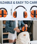 Bright Orange Adjustable Safety Earmuffs For Adults With Real Talk Comfort And Hearing Protection Noise Reduction NRR 26dB For Construction Work And Loud Environments Durable Over Ear Muffs For Shooters And Builders, foldable design shown next to backpack.