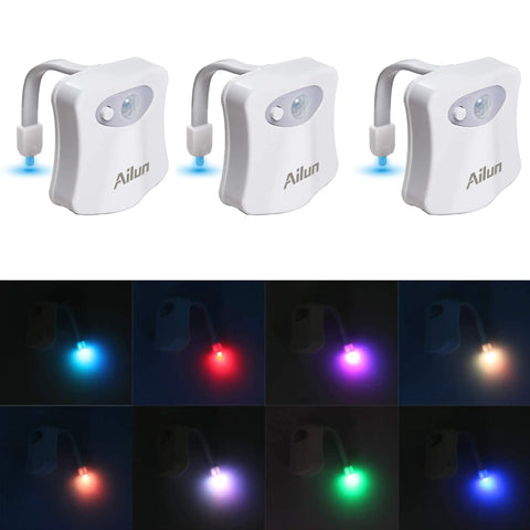 Motion Activated Toilet Night Light 3 Pack With 8 Color Changing LED Lights For Bathroom Use Waterproof Toilet Bowl Glow Battery Not Included Perfect Faucet Light Accent For Nighttime Safety And Decor showing white fixtures and color options.