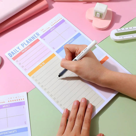 Person writing on Portable Memo Pad Notebook For Daily Use With No Residue After Tearing, Ideal For Quick Notes, To Do Lists, Planning