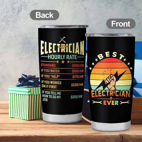 Front and back of Electrician Gift For Men 20oz Travel Coffee Tumbler Mug With Meaningful Script in black on a table.
