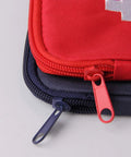 Close-up of red and blue bags from Two Pack Grab And Go First Aid Bag Portable Medical Kit, showcasing zippers and durable 600D Oxford cloth.