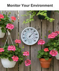 Outdoor Thermometer And Hygrometer, 10 Inch Round White Dial, Waterproof Wall Mount For Patio Garden Garage And Home, Rugged And Easy To Read Temperature And Humidity Monitor Built For All Weather Use, mounted on wooden fence