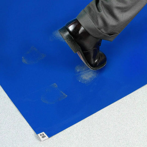 Blue LDPE Cleanroom Adhesive Mats For Entryways With Built Tough Peel And Reveal Sticky Floor Rolls That Trap Dirt Instantly Using No Fuss Swap Methods For Busy Workshops 18 By 36 Inch Heavy Duty Pack with a shoe stepping on it, showing dirt transfer.