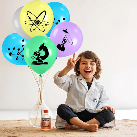 Science Party Balloons Set 12 Inch Confetti Balloons With Atoms And Microscopes Prints In Gray Blue Yellow Green Purple held by child in lab coat