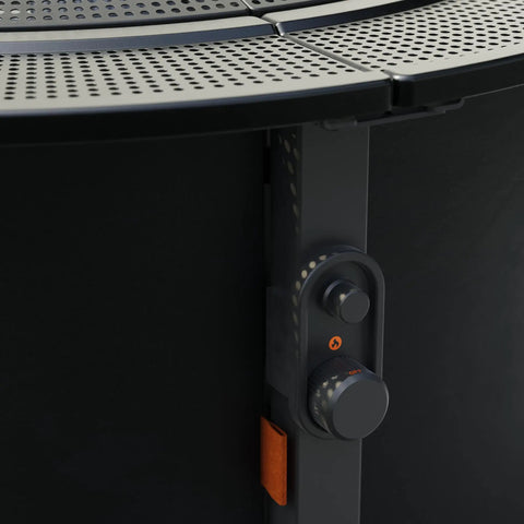 Infinity Flame Propane Fire Pit Outdoor Gas Table With Smokeless Signature Flame Design, close-up of control knob and perforated steel surface