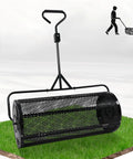 No Brainer 44 Inch Push And Tow Compost Spreader with metal mesh roller on grass for lawn care and garden spreading.