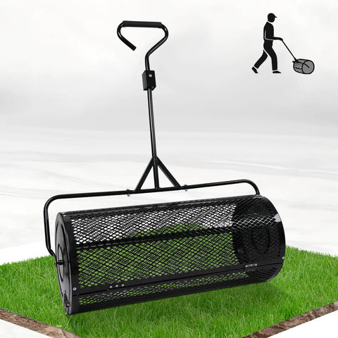 No Brainer 44 Inch Push And Tow Compost Spreader with metal mesh roller on grass for lawn care and garden spreading.