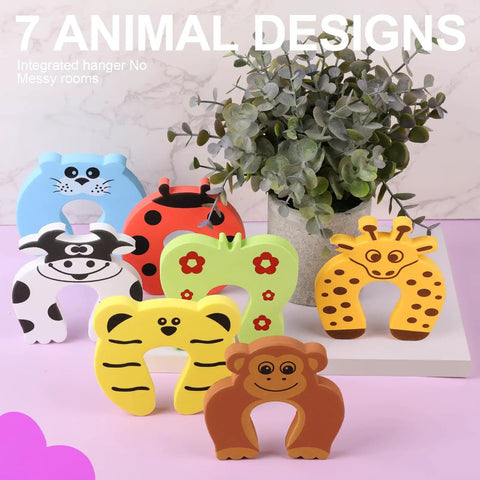 7 Pack Kid Safe Baby Proofing Door Stoppers With Cartoon Animal Corner Protectors displayed with plant backdrop